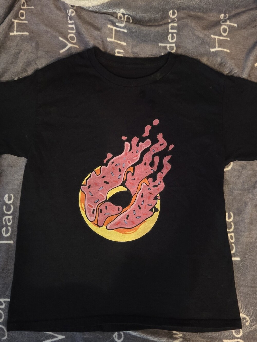 Kids Black Tee with Pink "FIRE MERCH" Donut Graphic